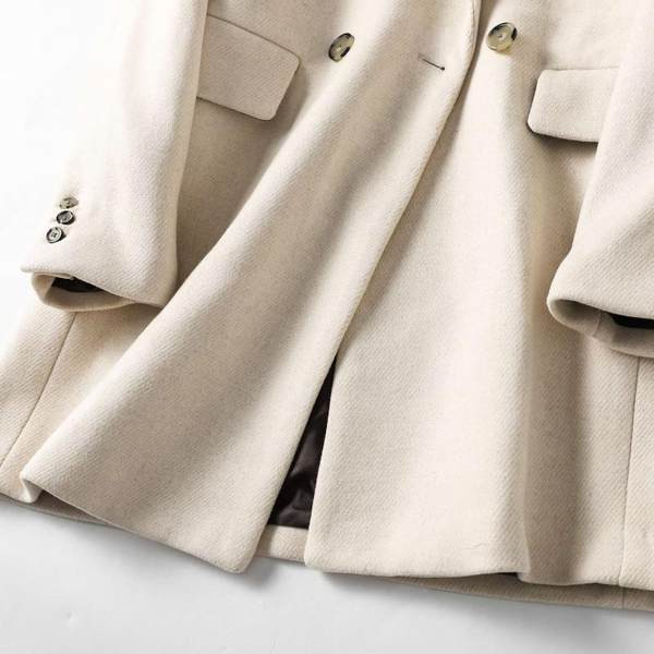 Naiste pikk mantel kaherealise kinnitusega