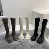 Bőr női csizma fűzővel és lapos talppal