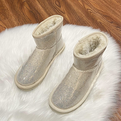 Ženske zimske čizme s toplom postavom i ravnim potplatom