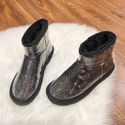 Ženske zimske čizme s toplom postavom i ravnim potplatom