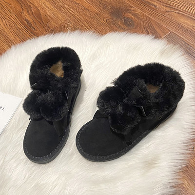 Alkalmi női csizma lapos talppal és pehellyel