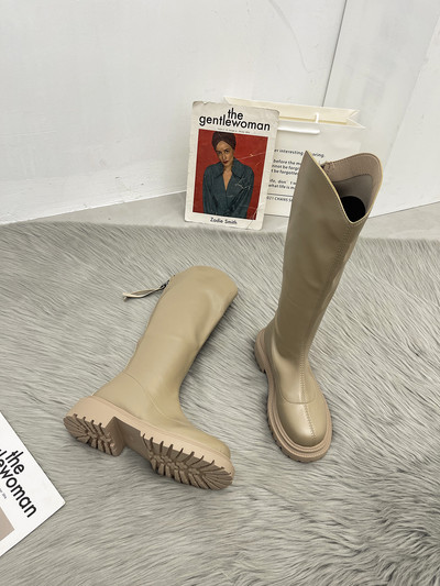 Műbőrből készült női csizma új modellje három színben