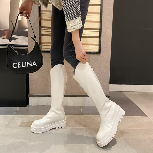 Stílusos női csizma sima modell lapos talppal