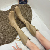 Női csizma új modell műbőrből, 6 cm magassággal