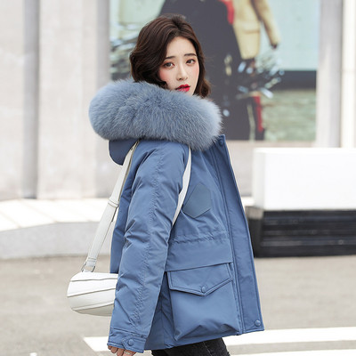 Női alkalmi kabát zsebekkel és meleg béléssel