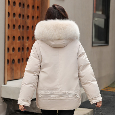 Női alkalmi kabát zsebekkel és meleg béléssel