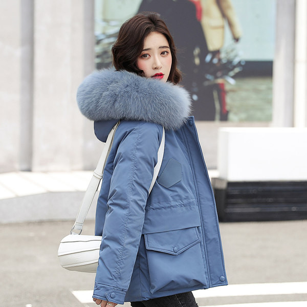 Női alkalmi kabát zsebekkel és meleg béléssel