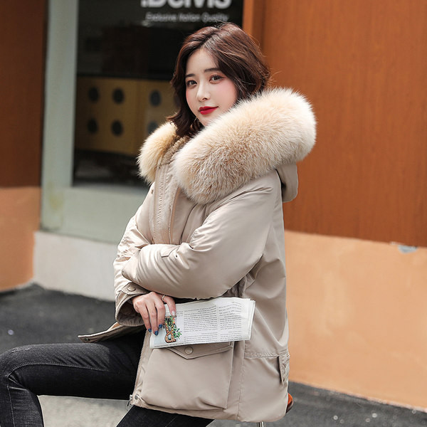 Női alkalmi kabát zsebekkel és meleg béléssel