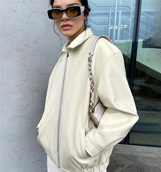 Női kabát cipzárral fehér és lila színben