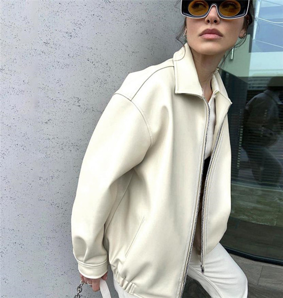 Női kabát cipzárral fehér és lila színben