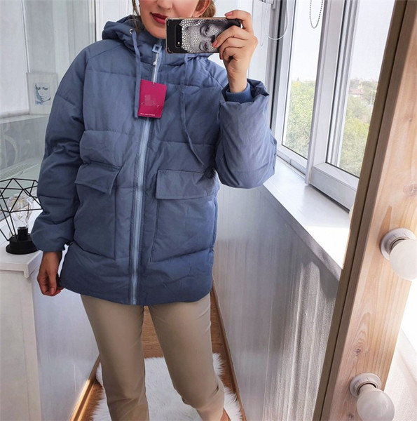 Ženska zimska jakna sa džepovima i patentnim zatvaračem