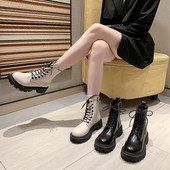 Kahes värvitoonis paeltega ökonahast naiste saapad