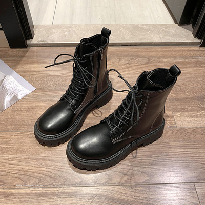 Kahes värvitoonis paeltega ökonahast naiste saapad