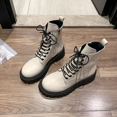 Kahes värvitoonis paeltega ökonahast naiste saapad