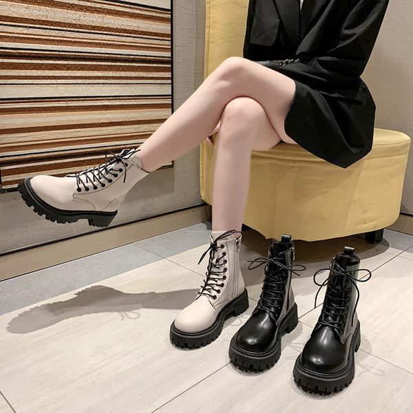 Kahes värvitoonis paeltega ökonahast naiste saapad