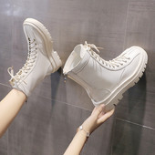 Kahes värvitoonis krobelise tallaga nahast saapad