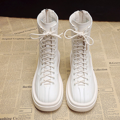 Kahes värvitoonis krobelise tallaga nahast saapad