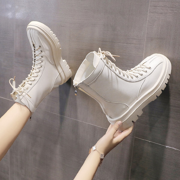 Kahes värvitoonis krobelise tallaga nahast saapad