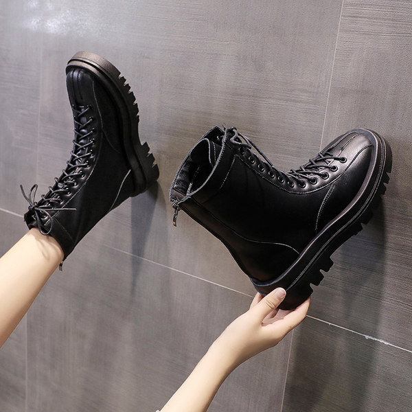 Kahes värvitoonis krobelise tallaga nahast saapad