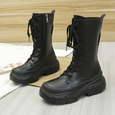 Alkalmi bőrcsizma cipzárral és durva talppal