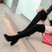 Női csizma fűzővel és sarokkal, fekete színben