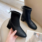 Fekete fűzős női bőrcsizma