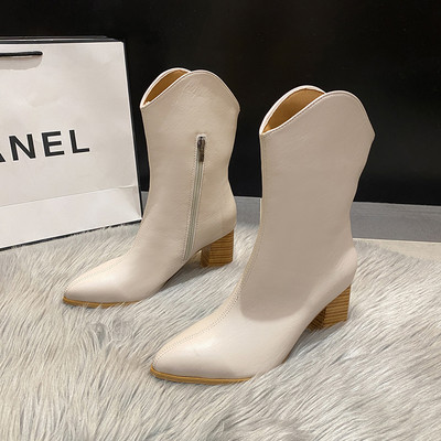 Női csizma hegyes modell sarokkal és cipzárral