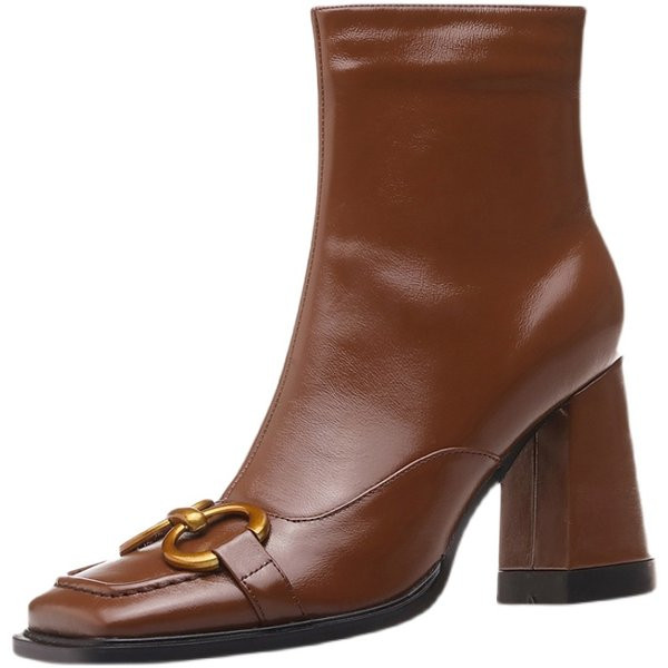 Modern női csizma csattal és cipzárral