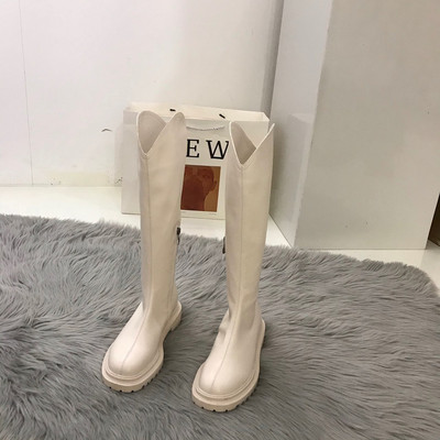 Alkalmi női csizma lekerekített cipzárral