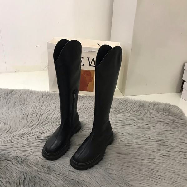 Alkalmi női csizma lekerekített cipzárral