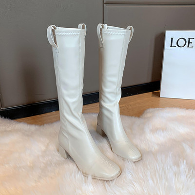 Műbőrből készült női csizma új modellje, magas 6 cm-es sarokkal - fehér és fekete