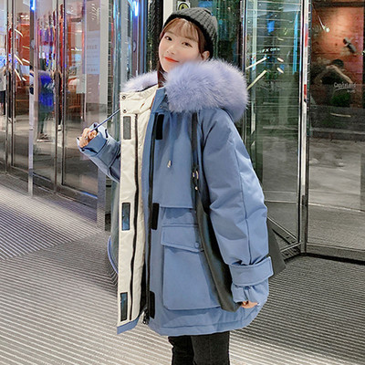 Női téli kabát zsebekkel és pehelyes