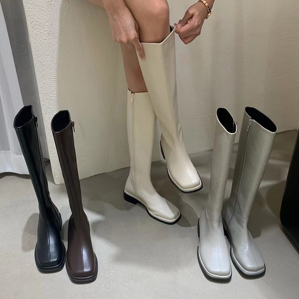 Alkalmi női csizma sima modell cipzárral