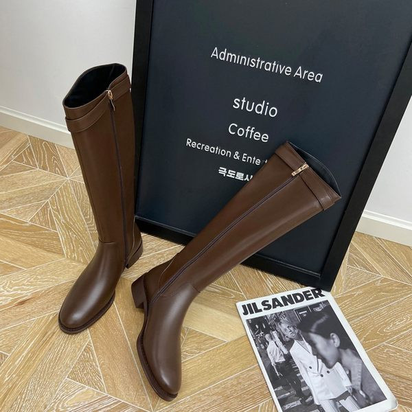 Eko-nahast stiilsed luku ja pandlaga naiste saapad