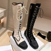 Modern női csizma fűzővel és cipzárral