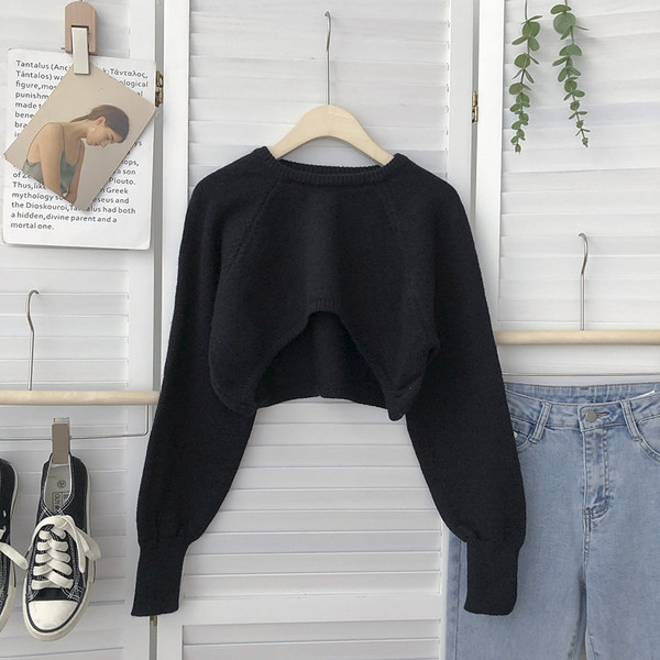 Széles női pulóver kerek nyakkivágással