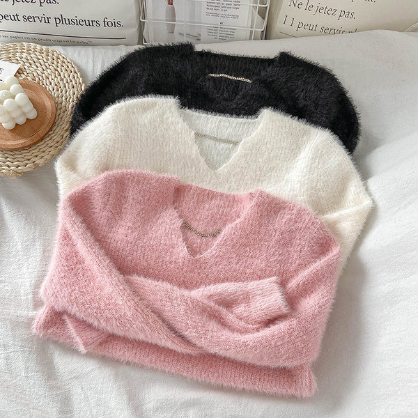 Sima női pulóver modell spitz nyakkivágással