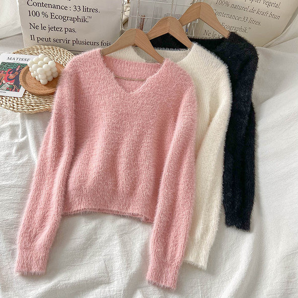 Sima női pulóver modell spitz nyakkivágással