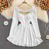 Modern női ruha hosszú ujjú fehér és fekete színben