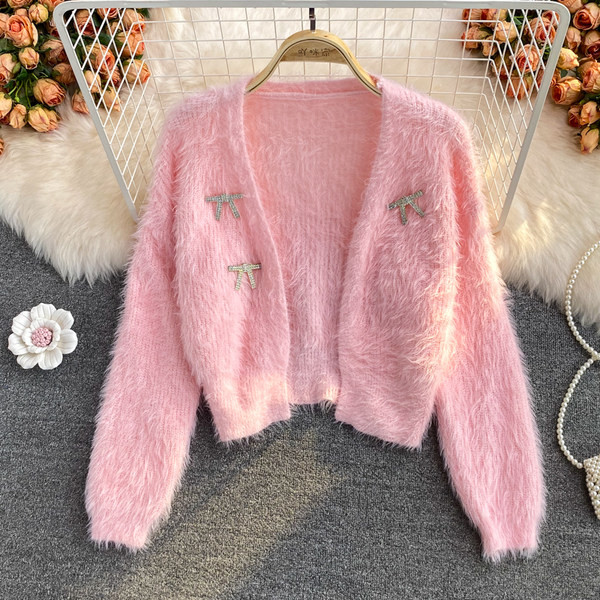 Női pehelymellény kövekkel és hosszú ujjú