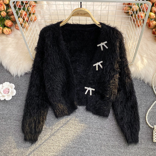 Női pehelymellény kövekkel és hosszú ujjú