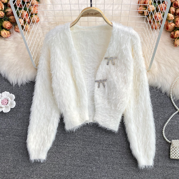 Női pehelymellény kövekkel és hosszú ujjú