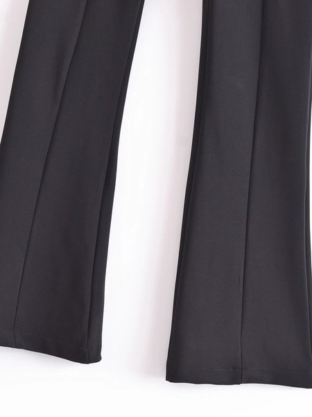 Moodsad väljalõikeelementidega pikad püksid