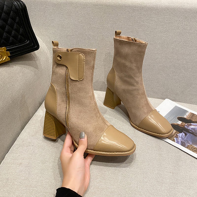 Modern női csizma magassarkúval és oldalsó cipzárral