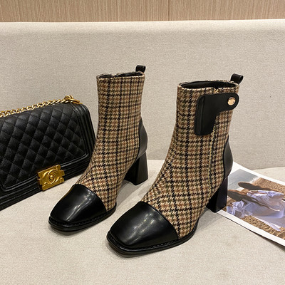 Modern női csizma magassarkúval és oldalsó cipzárral