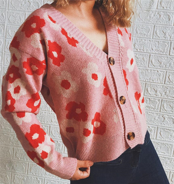Női kardigán virágmintával és gombokkal