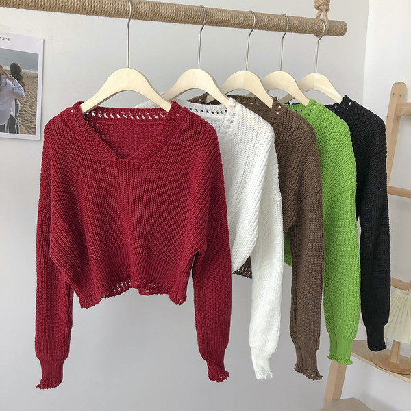 Új modellű pulóver spitz nyakkivágással