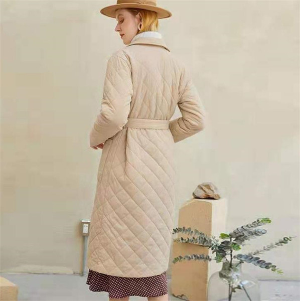 Pikk tepitud jakk vööga