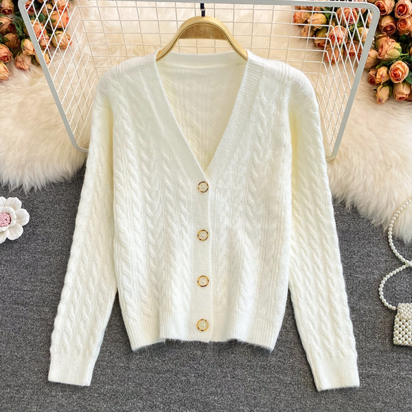 Vesta de dama cu nasturi si decolteu spitz - patru culori