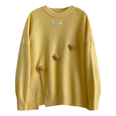 Széles női pulóver 3D elemekkel